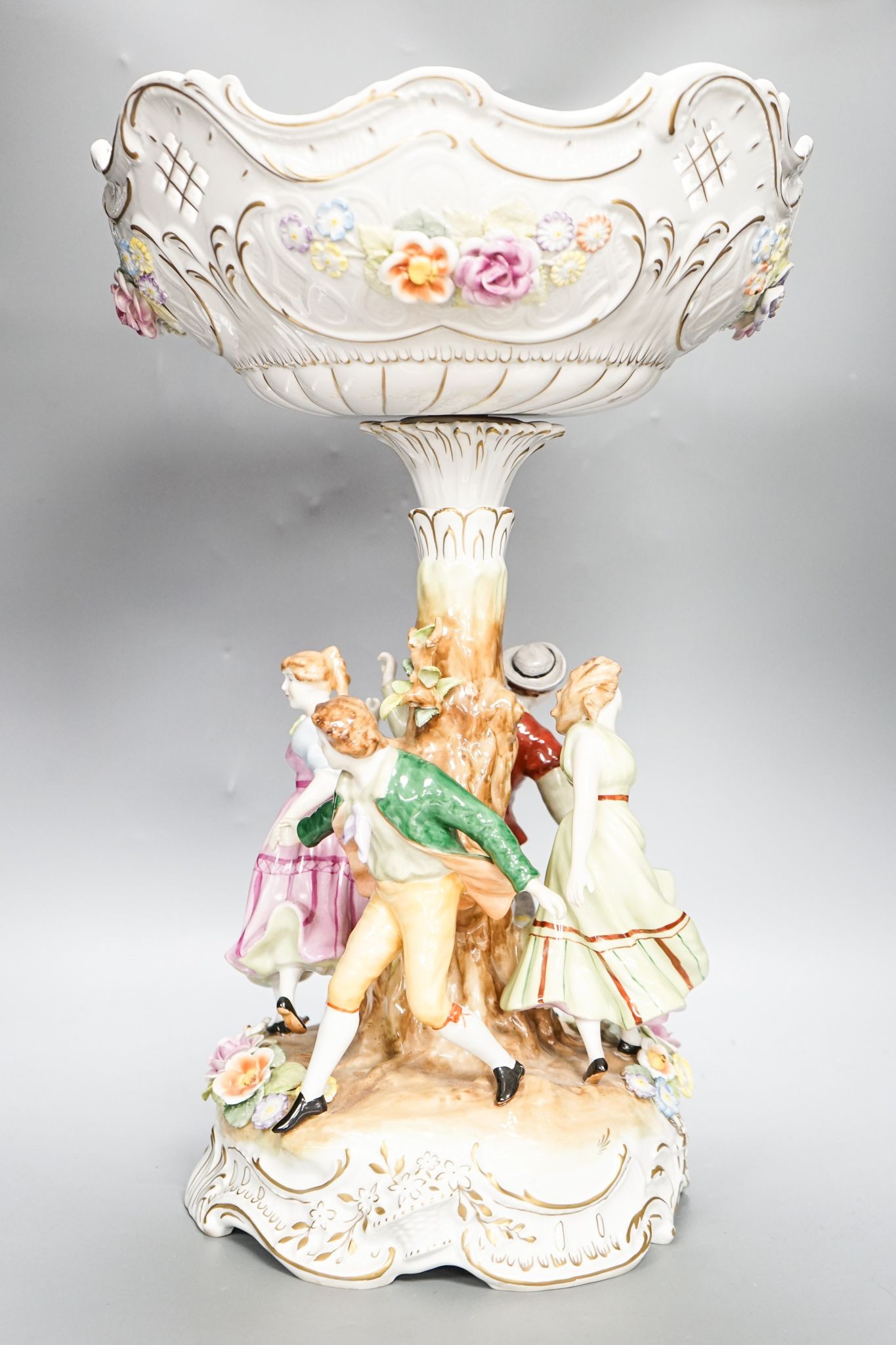 A continental figural centrepiece (repaired) 52cm